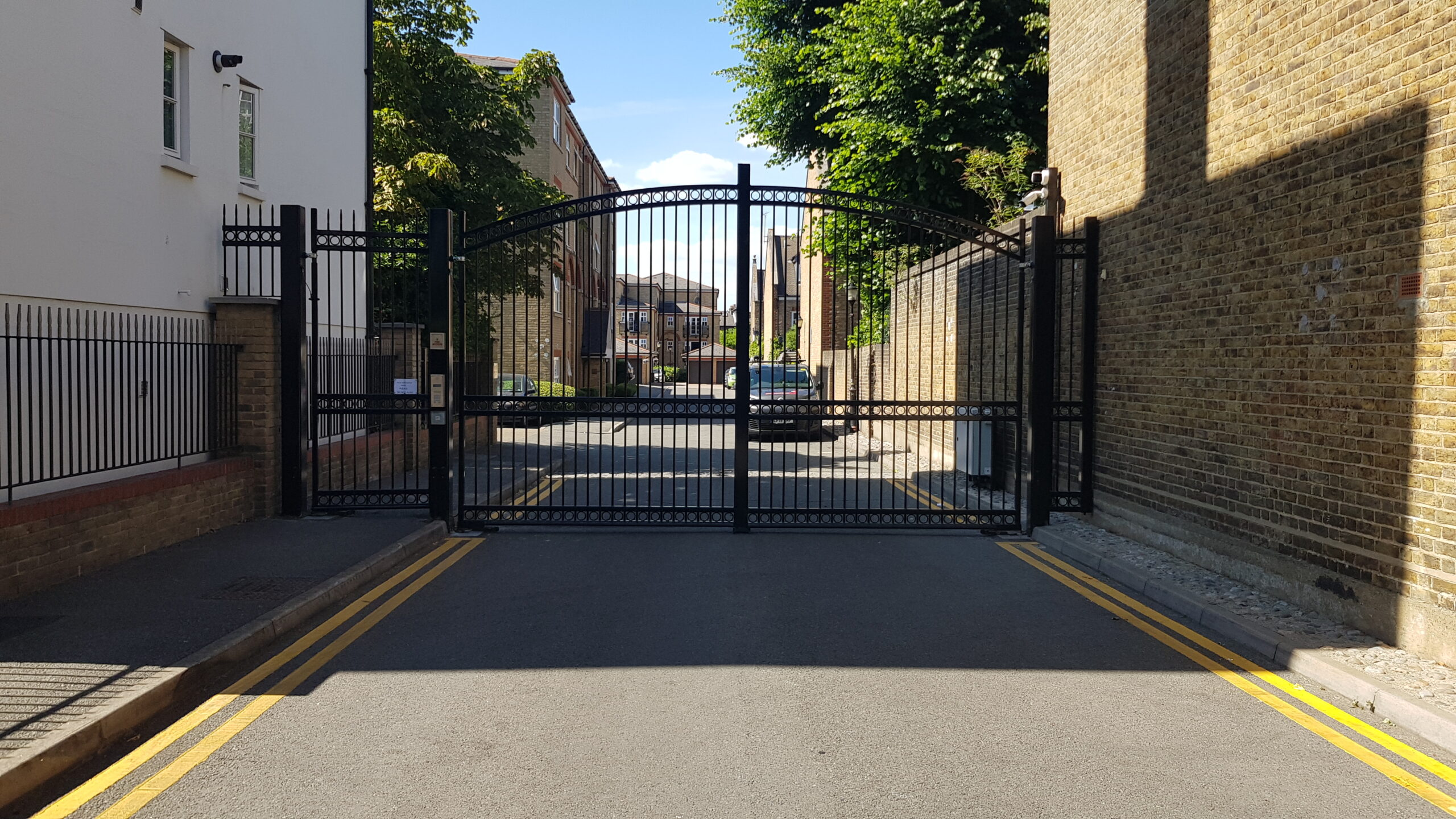 Metal swing electric gate - outside view